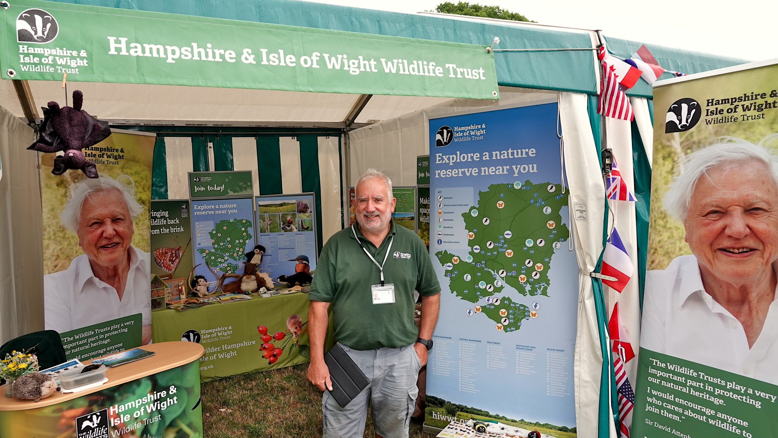 Hampshire and Isle of Wight Membership Recruiter in front of information stand